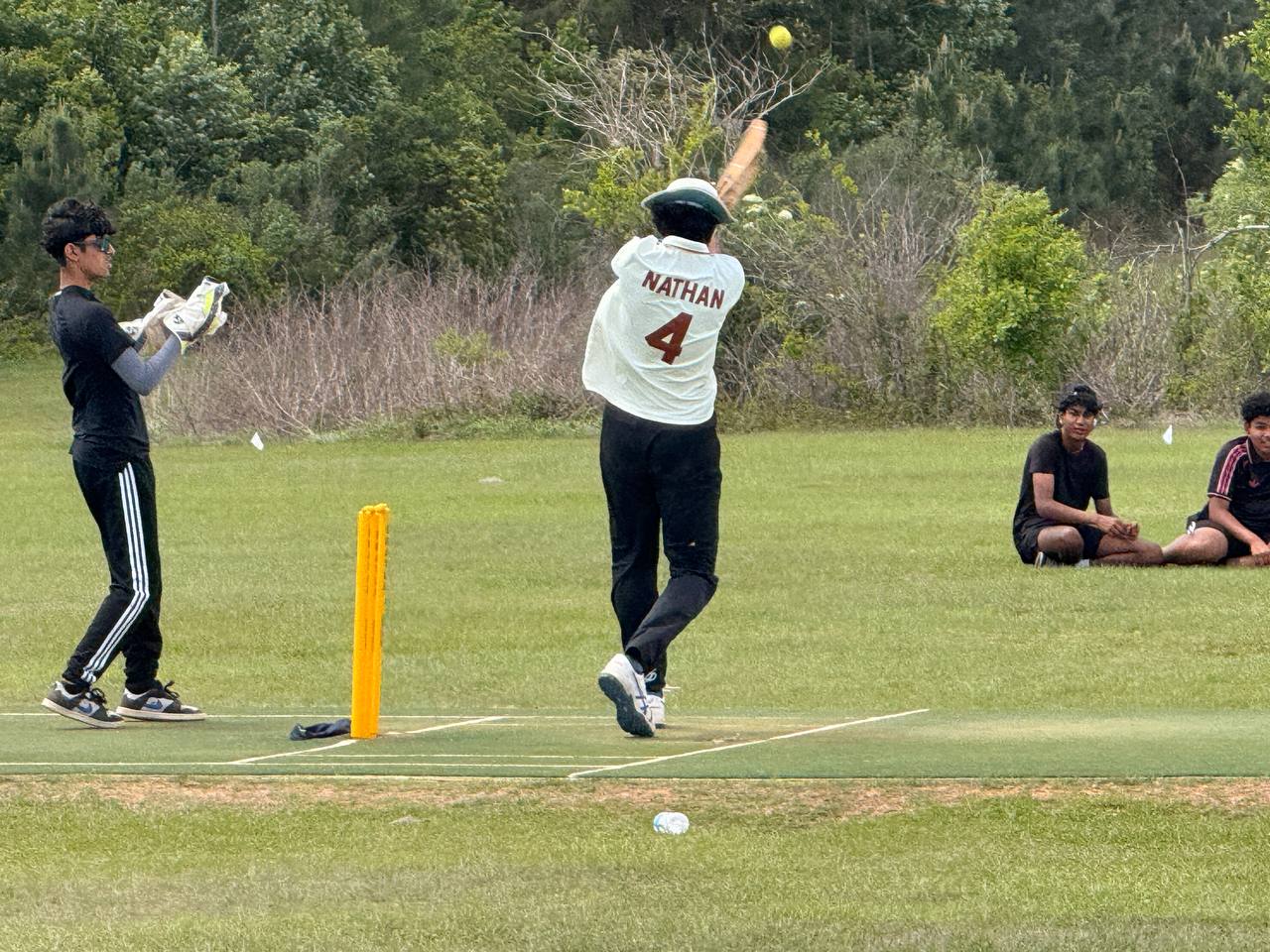 Cricket ball resting on the pitch